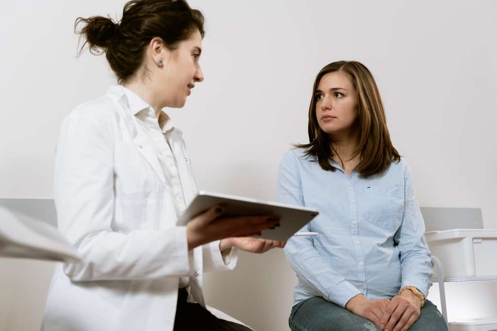 Female patient talking to a doctor