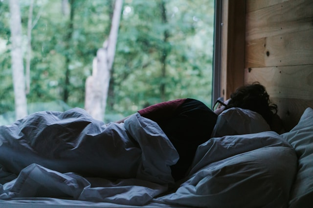 Man in bed sick with the seasonal influenza